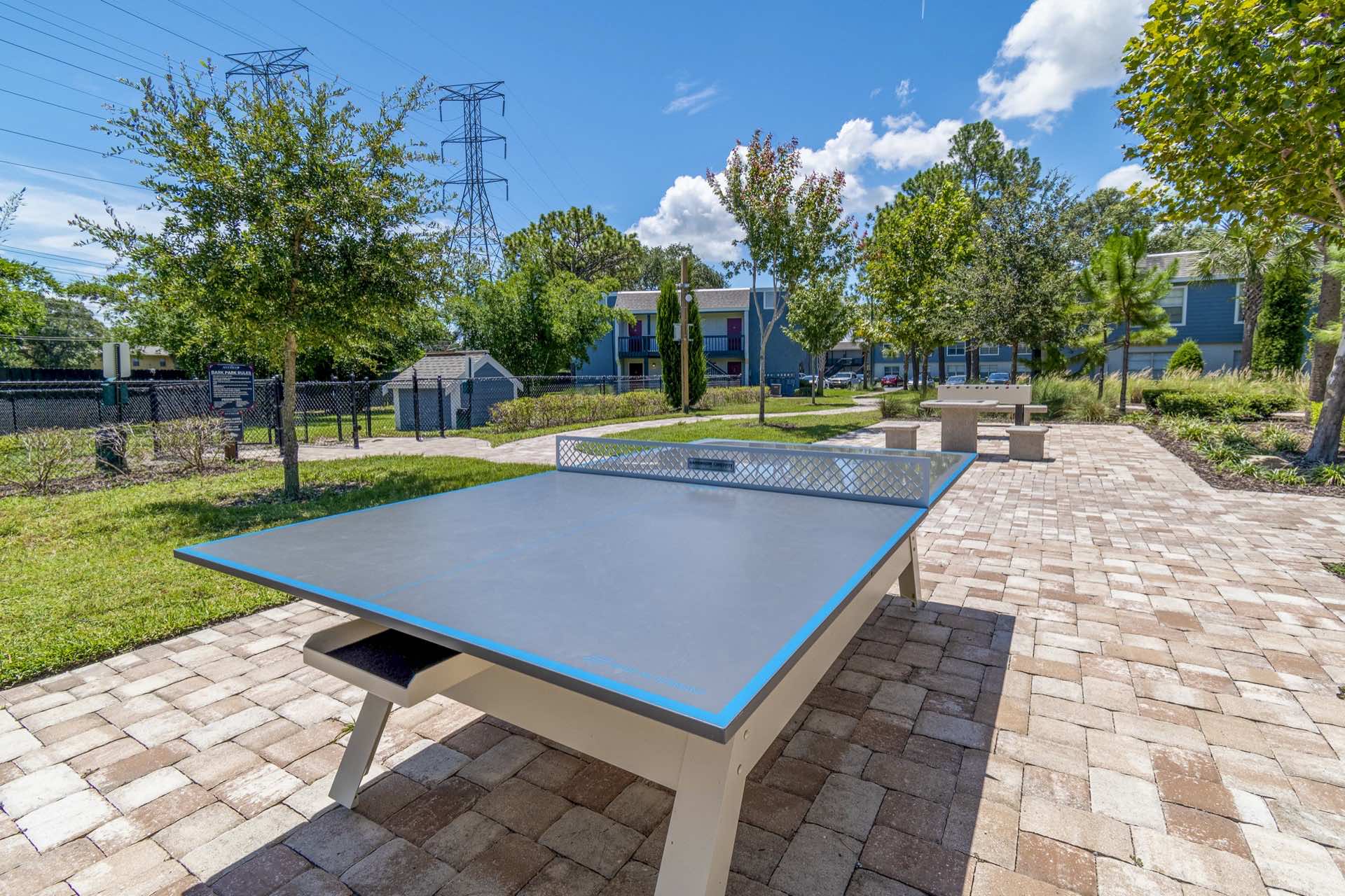 close-up photo of ping-pong table in outdoor game area