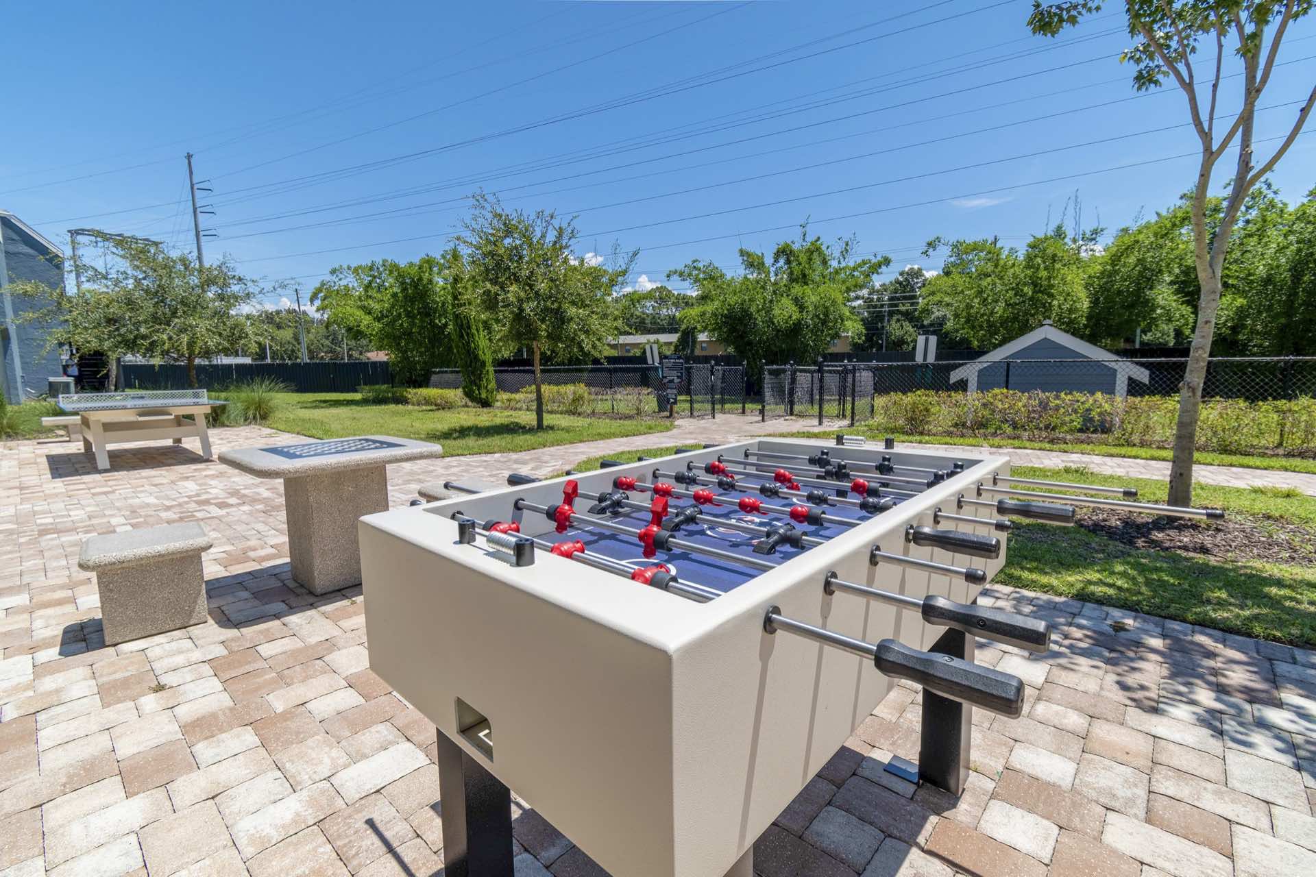 close-up photo of foosball table in outdoor game area